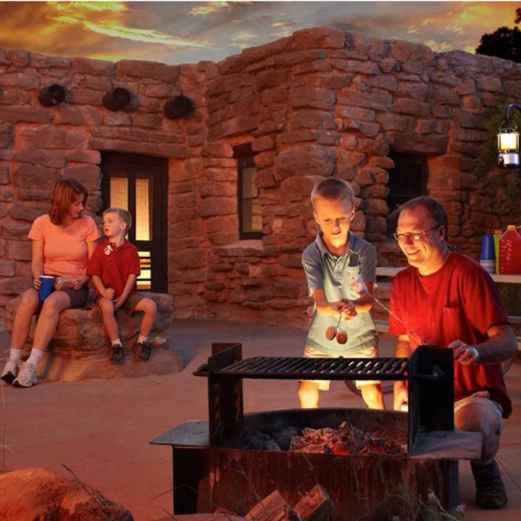 A family enjoys a cabin in Palo Duro Canyon State Park