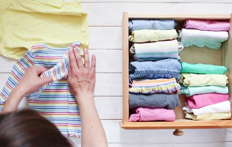Fold roll your clothes to save space